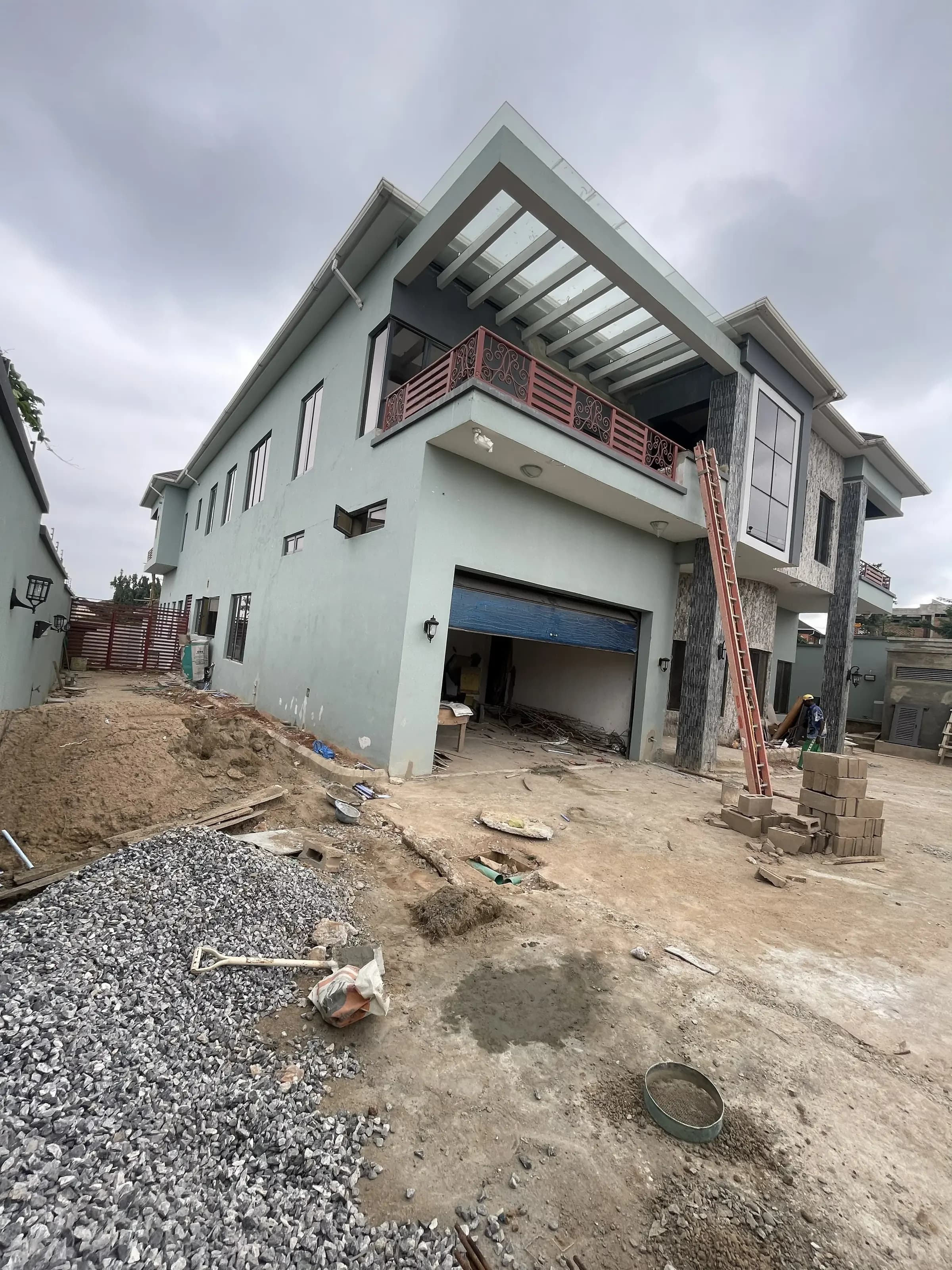 Abeokuta residence at an earlier construction stage, upper balcony and garage shell under finishing